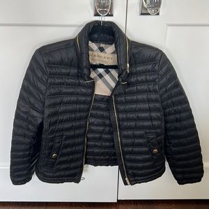 Few years old Burberry jacket. In great condition. Has a built in hood if wanted
